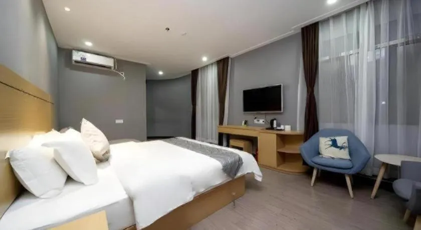 Bed in Ying Feng Yuan Hotel