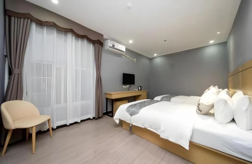 Bed in Ying Feng Yuan Hotel