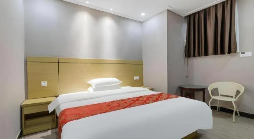 Bed in Ying Feng Yuan Hotel