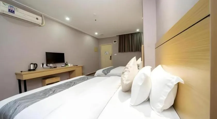 Bed in Ying Feng Yuan Hotel