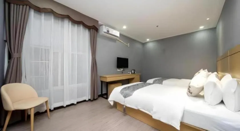 Bed in Ying Feng Yuan Hotel