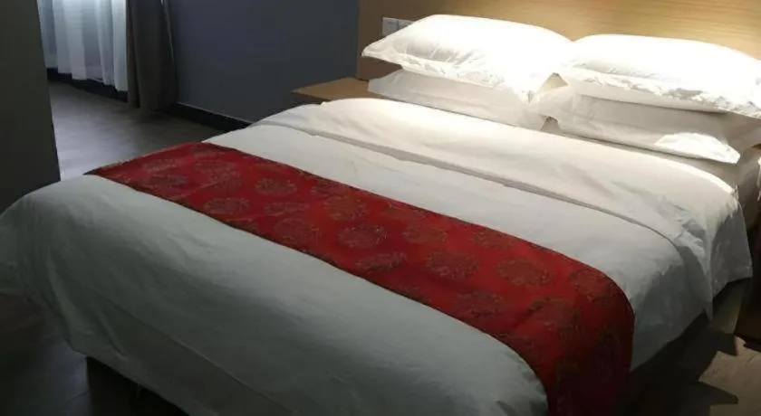 Bed in Ying Feng Yuan Hotel