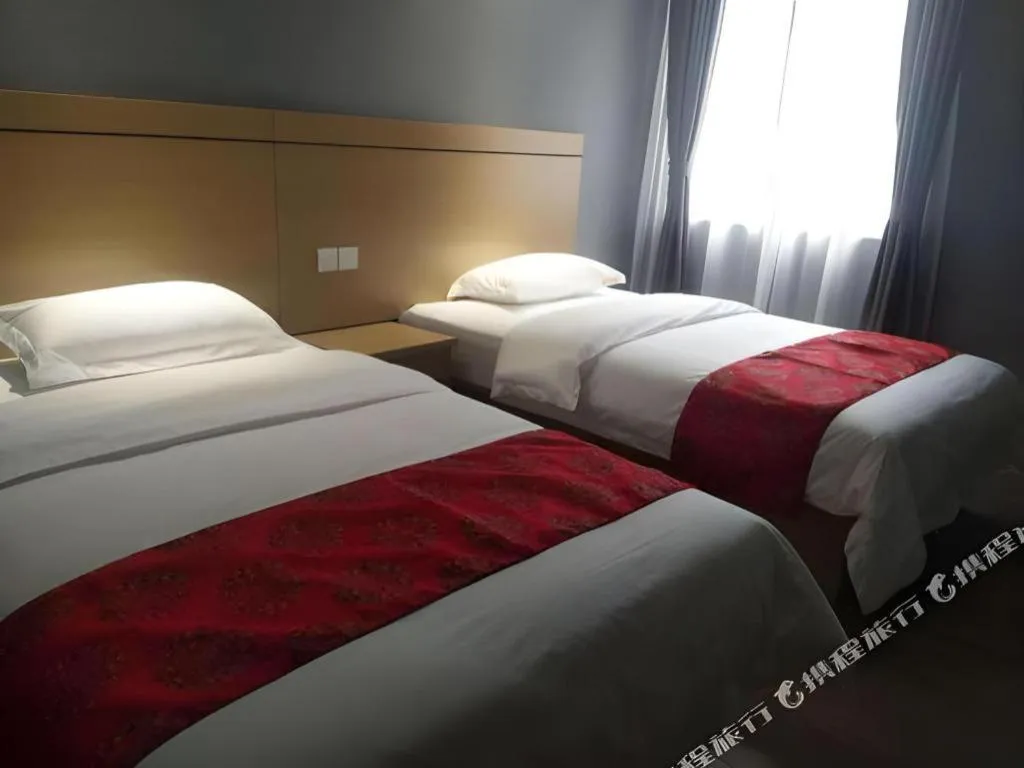 Bed in Ying Feng Yuan Hotel