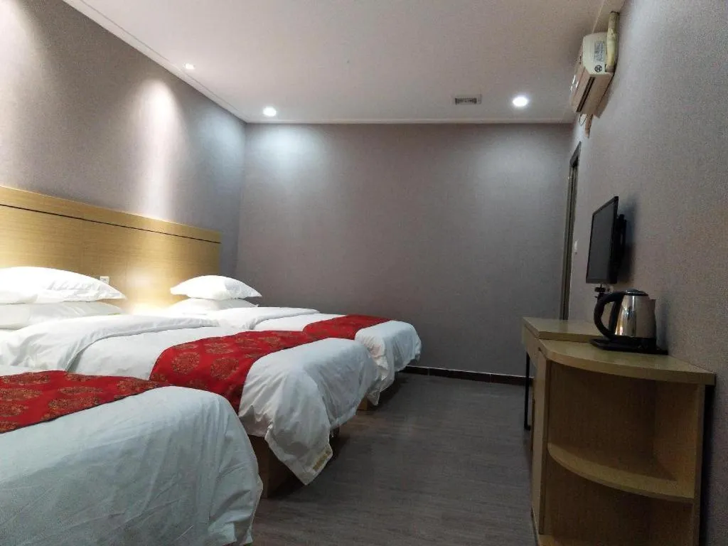 Bed in Ying Feng Yuan Hotel