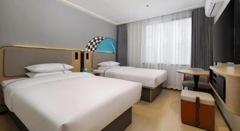 Bed in City Comfort Inn Guilin Xiangbi Mountain Park