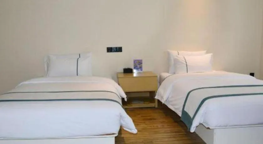 Bed in City Comfort Inn Tai'an Taishan Tianwai Village Hongmen