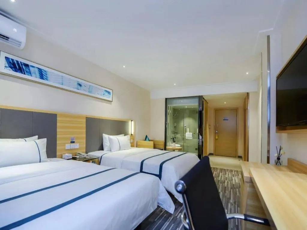 Bed in City Comfort Inn Guiyang Yan'an Middle Road Fountain Metro Station