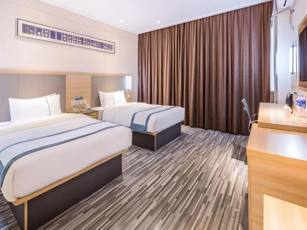 Bed in City Comfort Inn Guiyang Yan'an Middle Road Fountain Metro Station