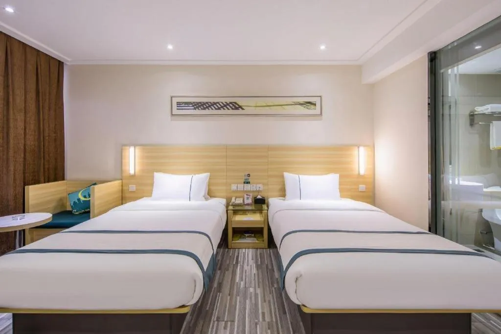 Bed in City Comfort Inn Guiyang Yan'an Middle Road Fountain Metro Station