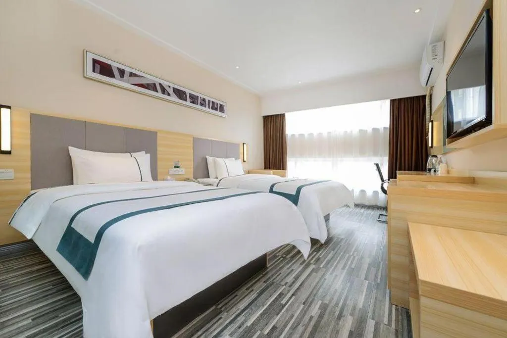 Bed in City Comfort Inn Guiyang Yan'an Middle Road Fountain Metro Station