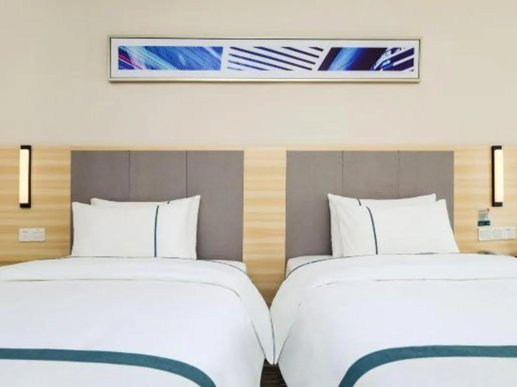 Bed in City Comfort Inn Guiyang Yan'an Middle Road Fountain Metro Station