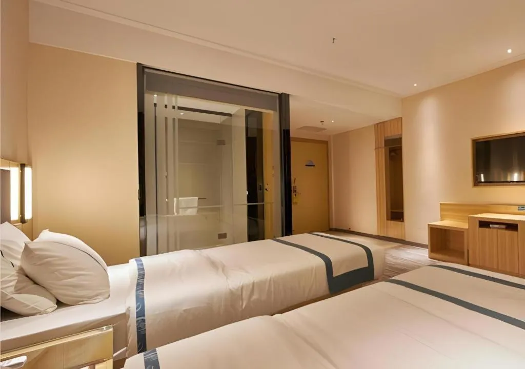 Bed in City Comfort Inn Liuzhou High-speed Railway Station Entrance