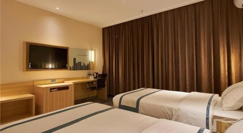 Bed in City Comfort Inn Liuzhou High-speed Railway Station Entrance