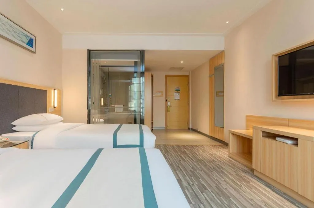 Bed in City Comfort Inn Liuzhou High-speed Railway Station Entrance