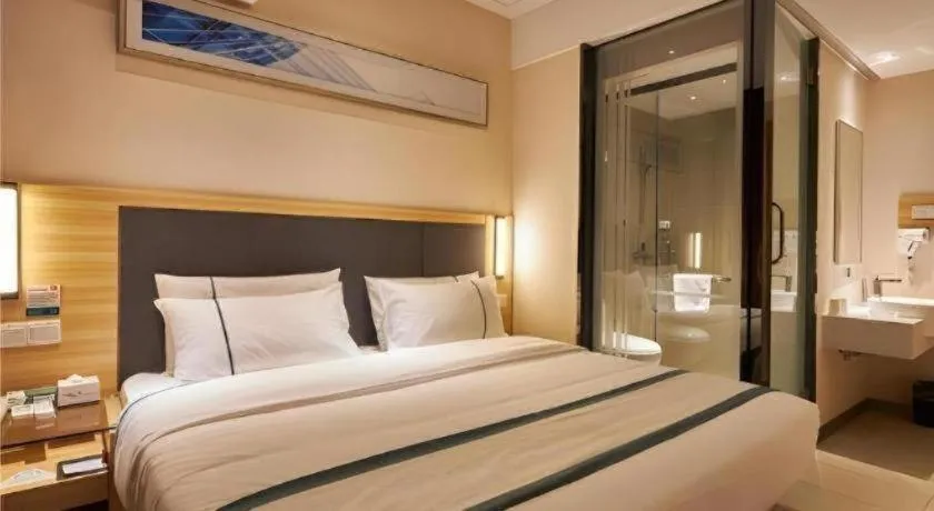 Bed in City Comfort Inn Liuzhou High-speed Railway Station Entrance