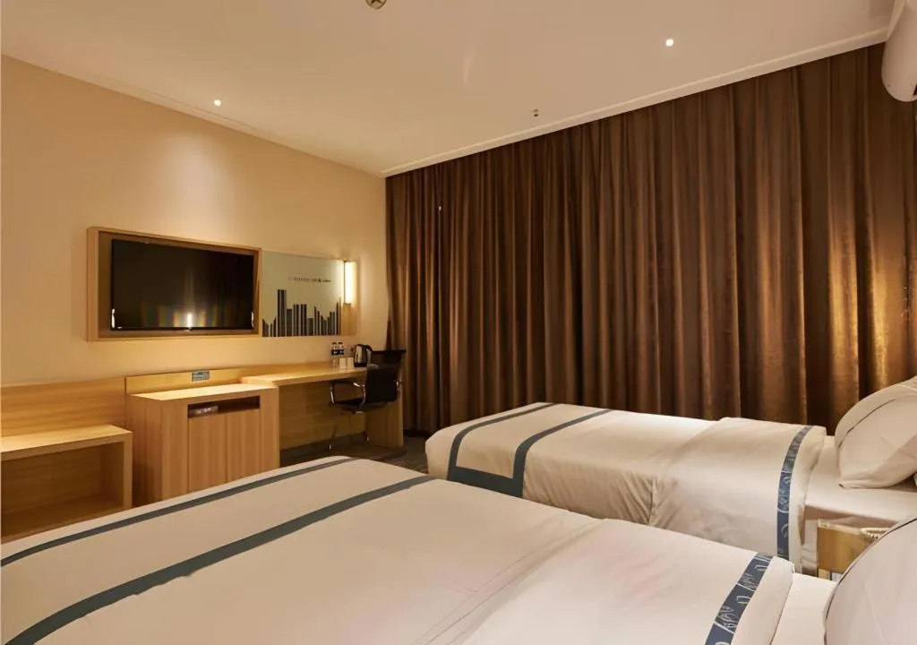 Bed in City Comfort Inn Liuzhou High-speed Railway Station Entrance