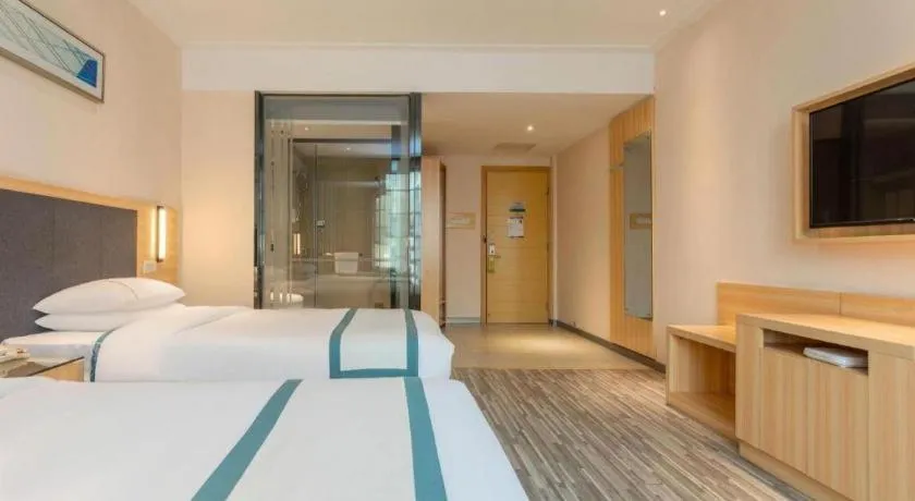 Bed in City Comfort Inn Liuzhou High-speed Railway Station Entrance