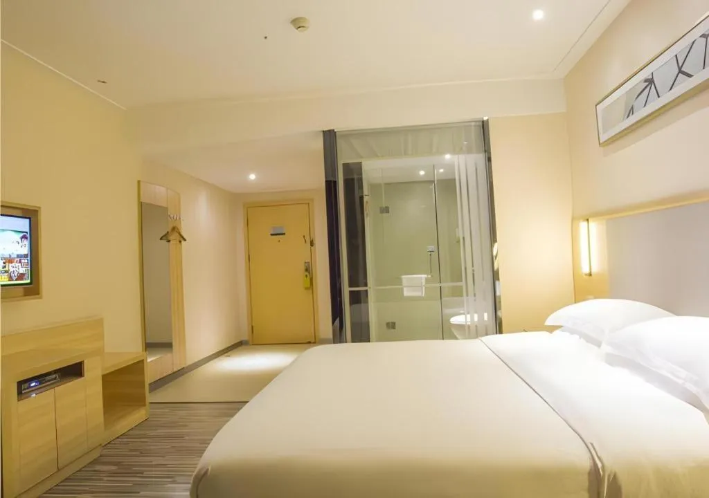 Bed in City Comfort Inn Fangcheng Qunxing Avenue