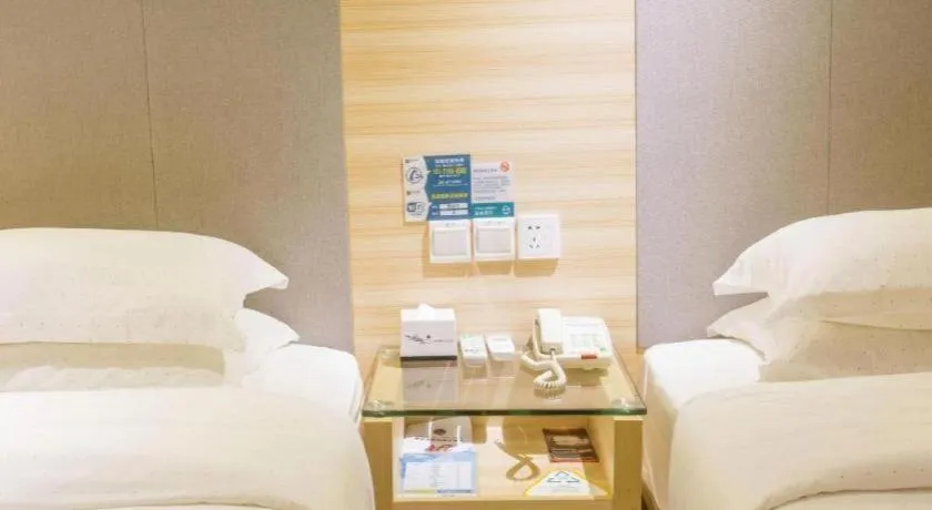 Bed in City Comfort Inn Fangcheng Qunxing Avenue