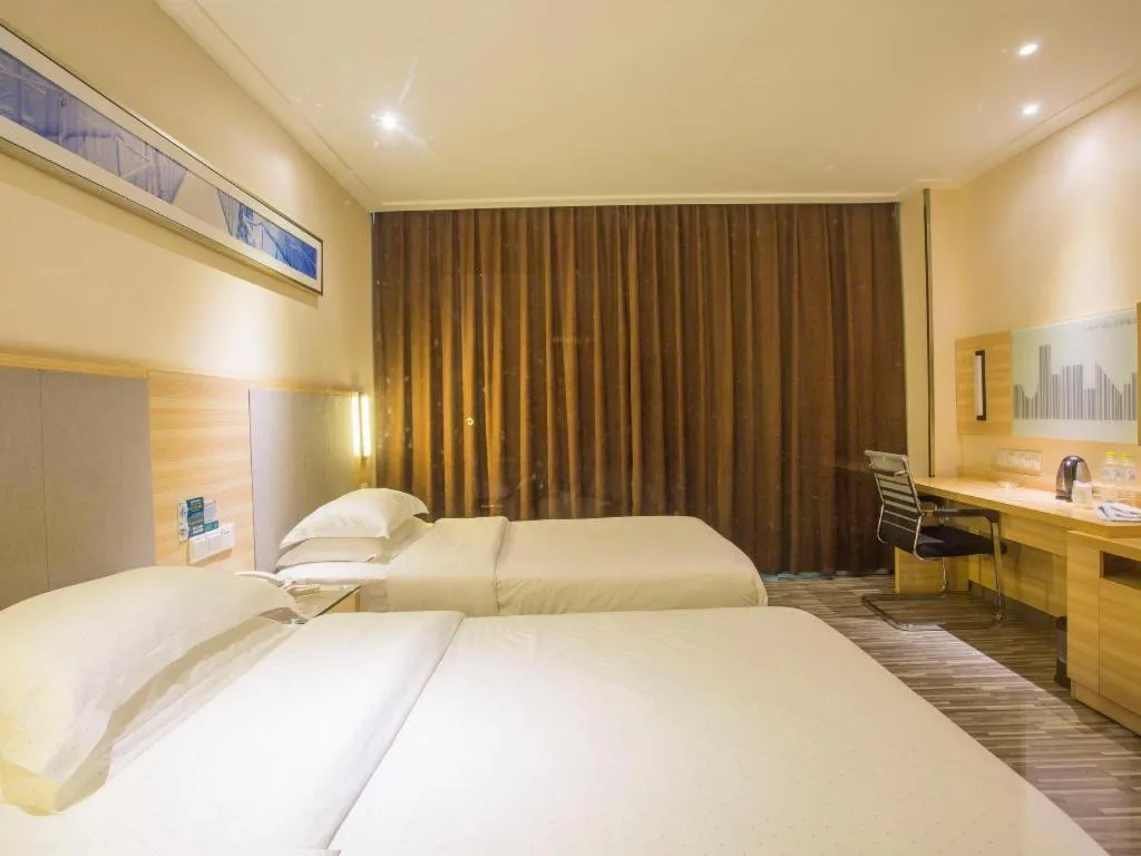 Bed in City Comfort Inn Fangcheng Qunxing Avenue