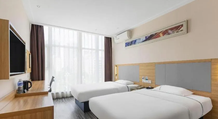 Bed in City Comfort Inn Fangcheng Qunxing Avenue