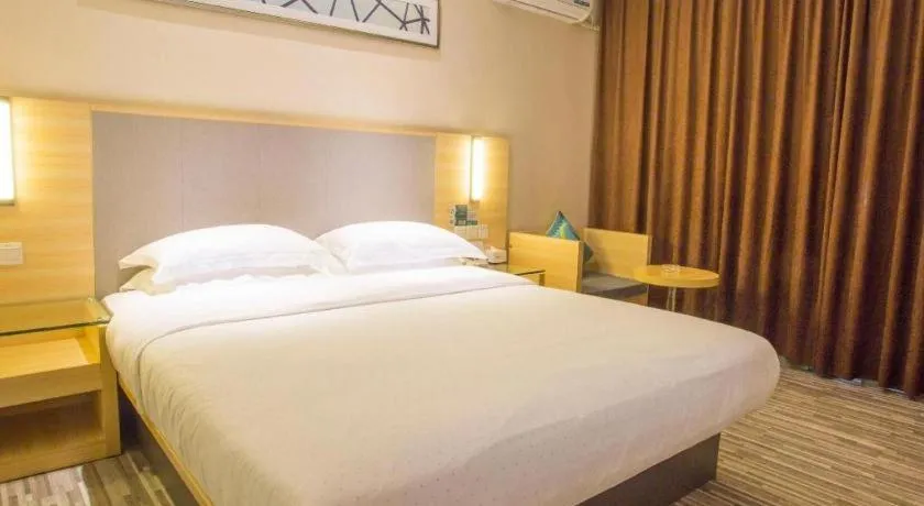 Bed in City Comfort Inn Fangcheng Qunxing Avenue