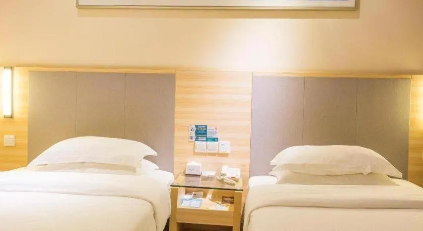 Bed in City Comfort Inn Fangcheng Qunxing Avenue