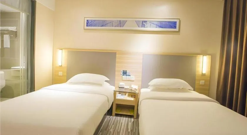 Bed in City Comfort Inn Fangcheng Qunxing Avenue