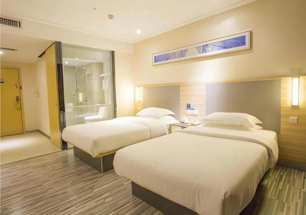 Bed in City Comfort Inn Fangcheng Qunxing Avenue
