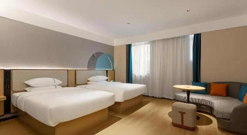 Bed in City Comfort Inn Huanggang Tuanfeng Passenger