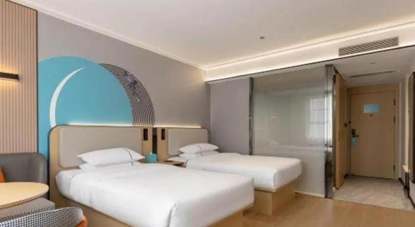 Bed in City Comfort Inn Huanggang Tuanfeng Passenger