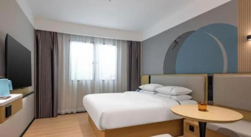 Bed in City Comfort Inn Huanggang Tuanfeng Passenger