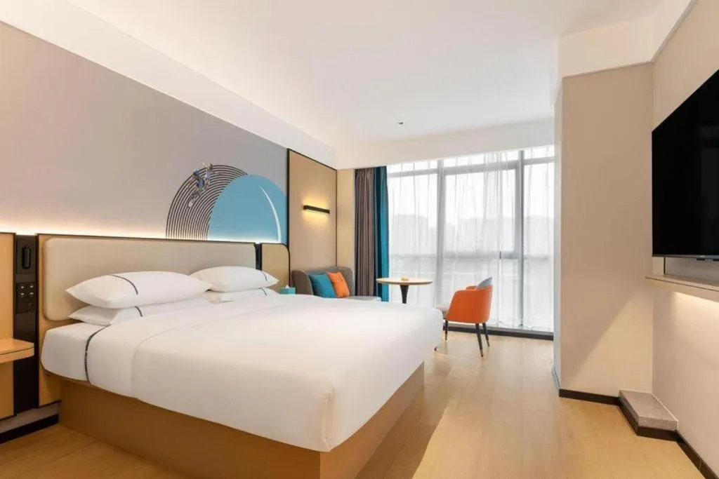 Bed in City Comfort Inn Huanggang Tuanfeng Passenger