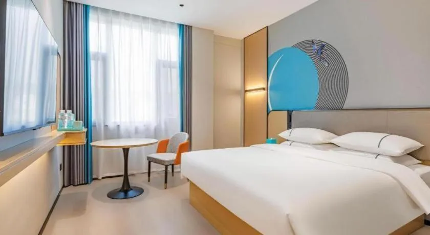 Bed in City Comfort Inn Huanggang Tuanfeng Passenger