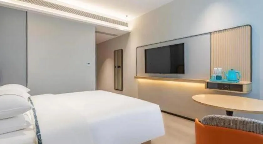 Bed in City Comfort Inn Huanggang Tuanfeng Passenger