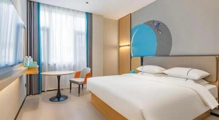 Bed in City Comfort Inn Huanggang Tuanfeng Passenger