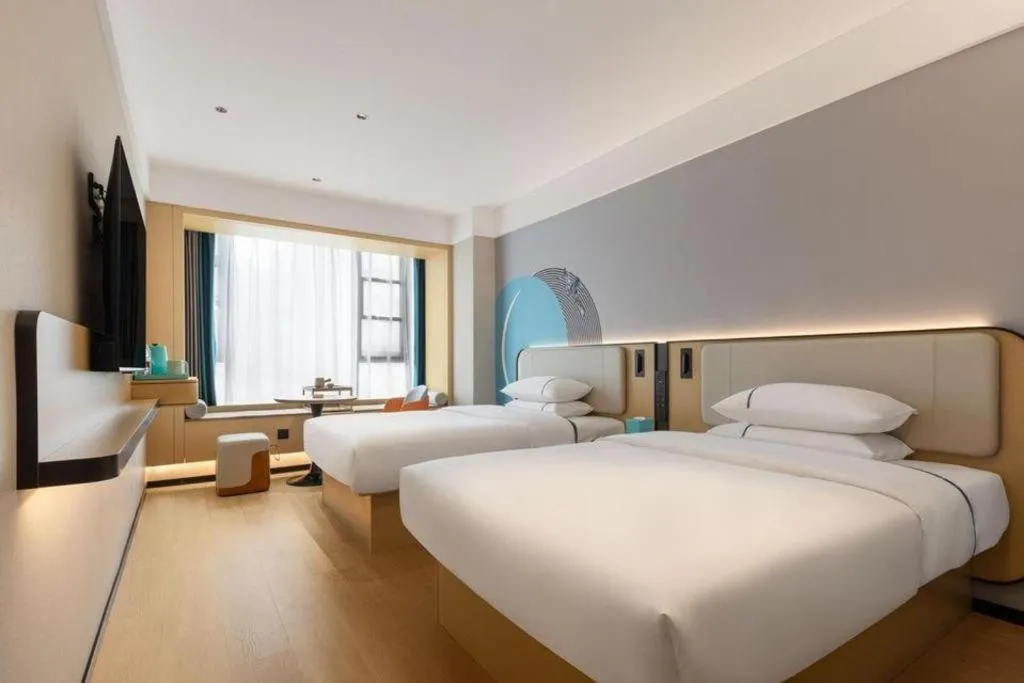 Bed in City Comfort Inn Huanggang Tuanfeng Passenger