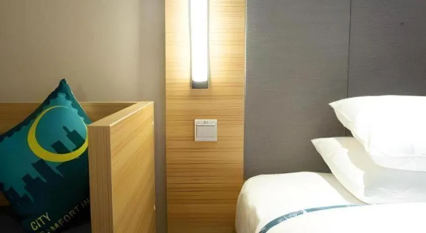 Bed in City Comfort Inn Huanggang Tuanfeng Passenger
