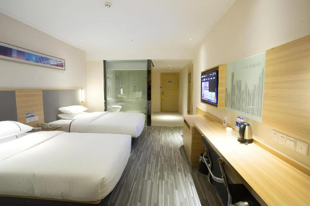 Bed in City Comfort Inn Huanggang Tuanfeng Passenger