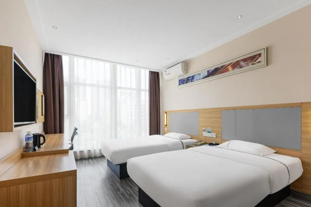 Bed in City Comfort Inn Guilin Quanzhou Zhongxin Square