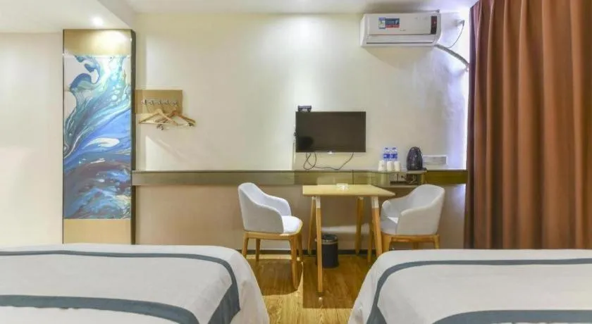 Bed in City Comfort Inn Zhuhai Qinglv Middle Road Riyuebei Grand Theater