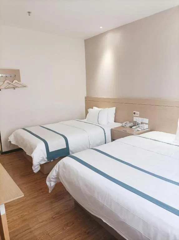 Bed in City Comfort Inn Zhuhai Qinglv Middle Road Riyuebei Grand Theater