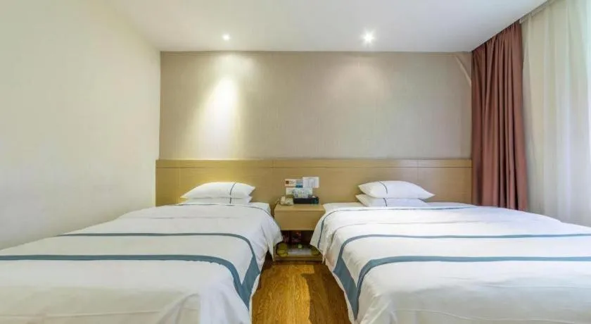 Bed in City Comfort Inn Zhuhai Qinglv Middle Road Riyuebei Grand Theater