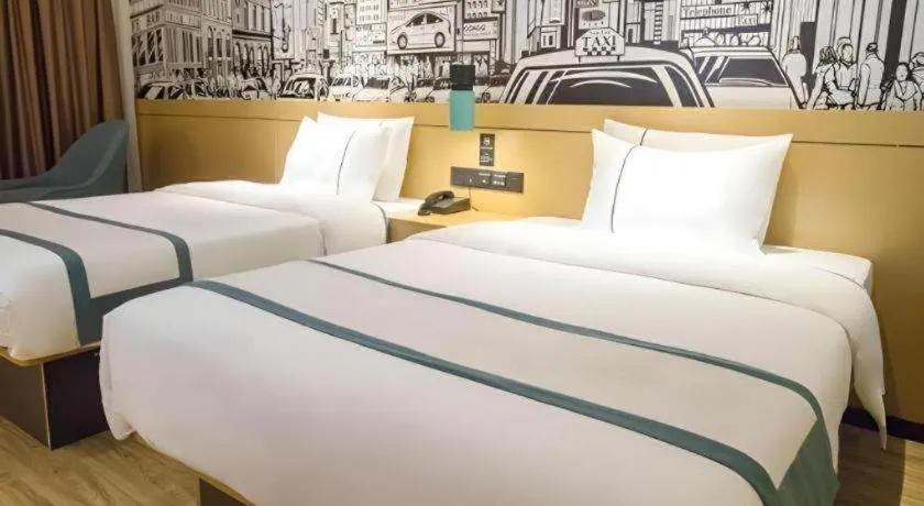 Bed in City Comfort Inn Beiliu Yongfeng Plaza Chengnan Bus Station