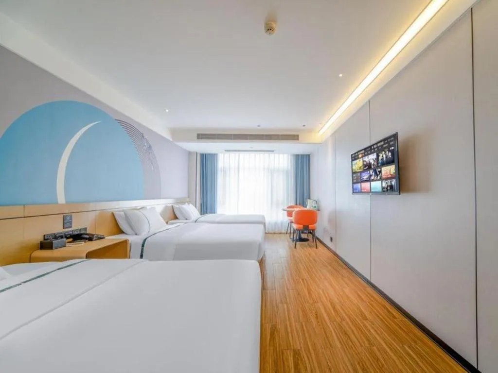 Bed in City Comfort Inn Zhanjiang Xuwen Port Wharf Passenger Station