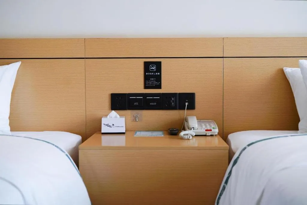 Bed in City Comfort Inn Zhanjiang Xuwen Port Wharf Passenger Station