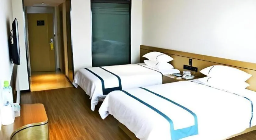Bed in City Comfort Inn Zhanjiang Xuwen Port Wharf Passenger Station