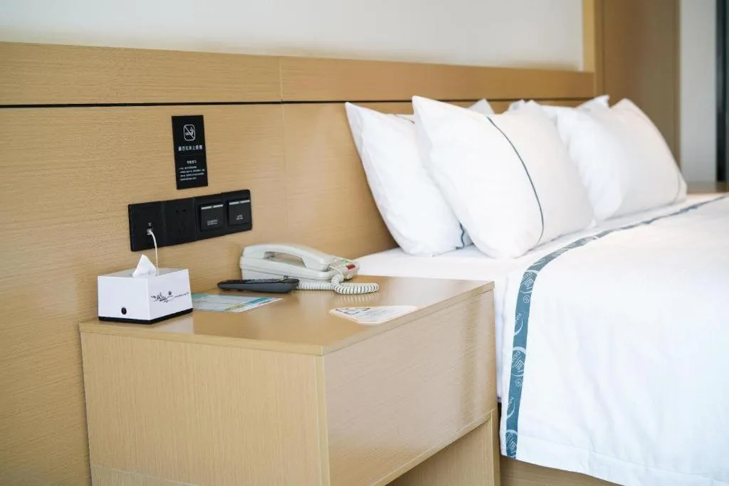 Bed in City Comfort Inn Zhanjiang Xuwen Port Wharf Passenger Station