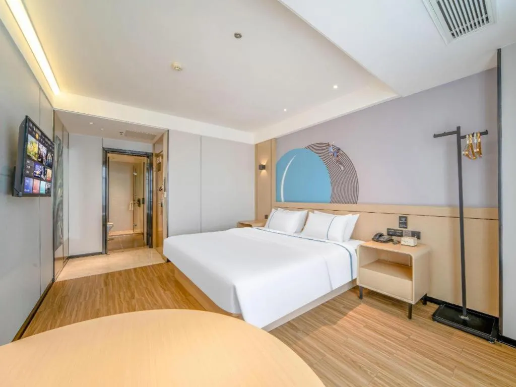 Bed in City Comfort Inn Zhanjiang Xuwen Port Wharf Passenger Station