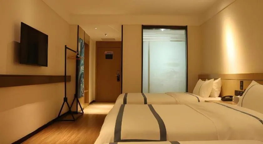 Bed in City Comfort Inn Zhanjiang Xuwen Port Wharf Passenger Station